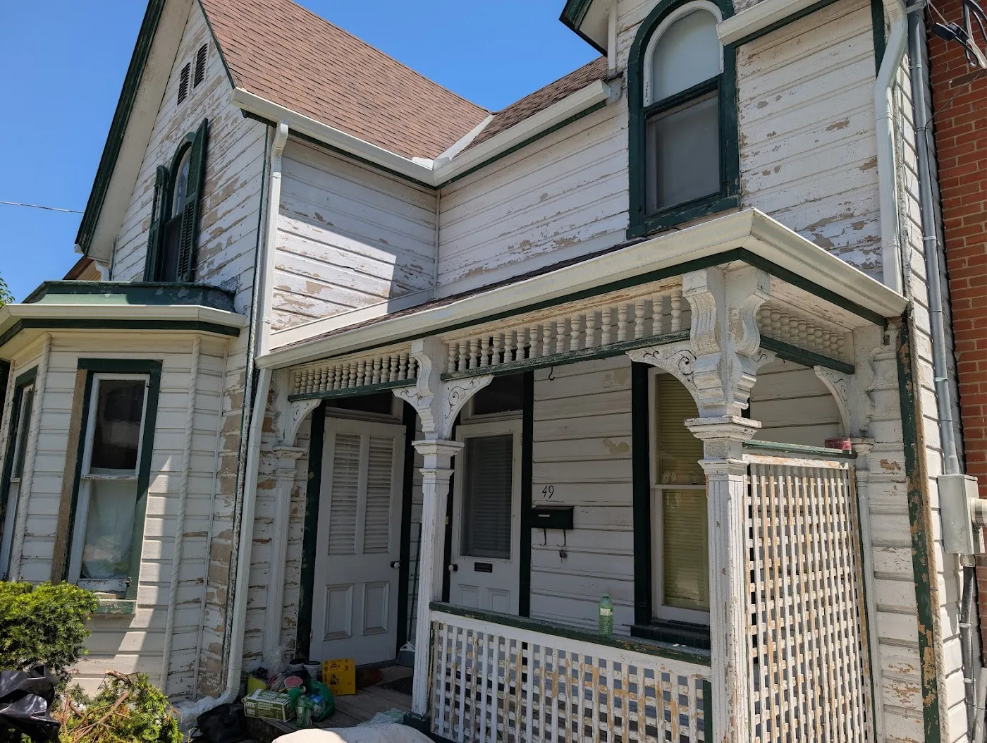 Eaves and lap siding detail, freshly painted