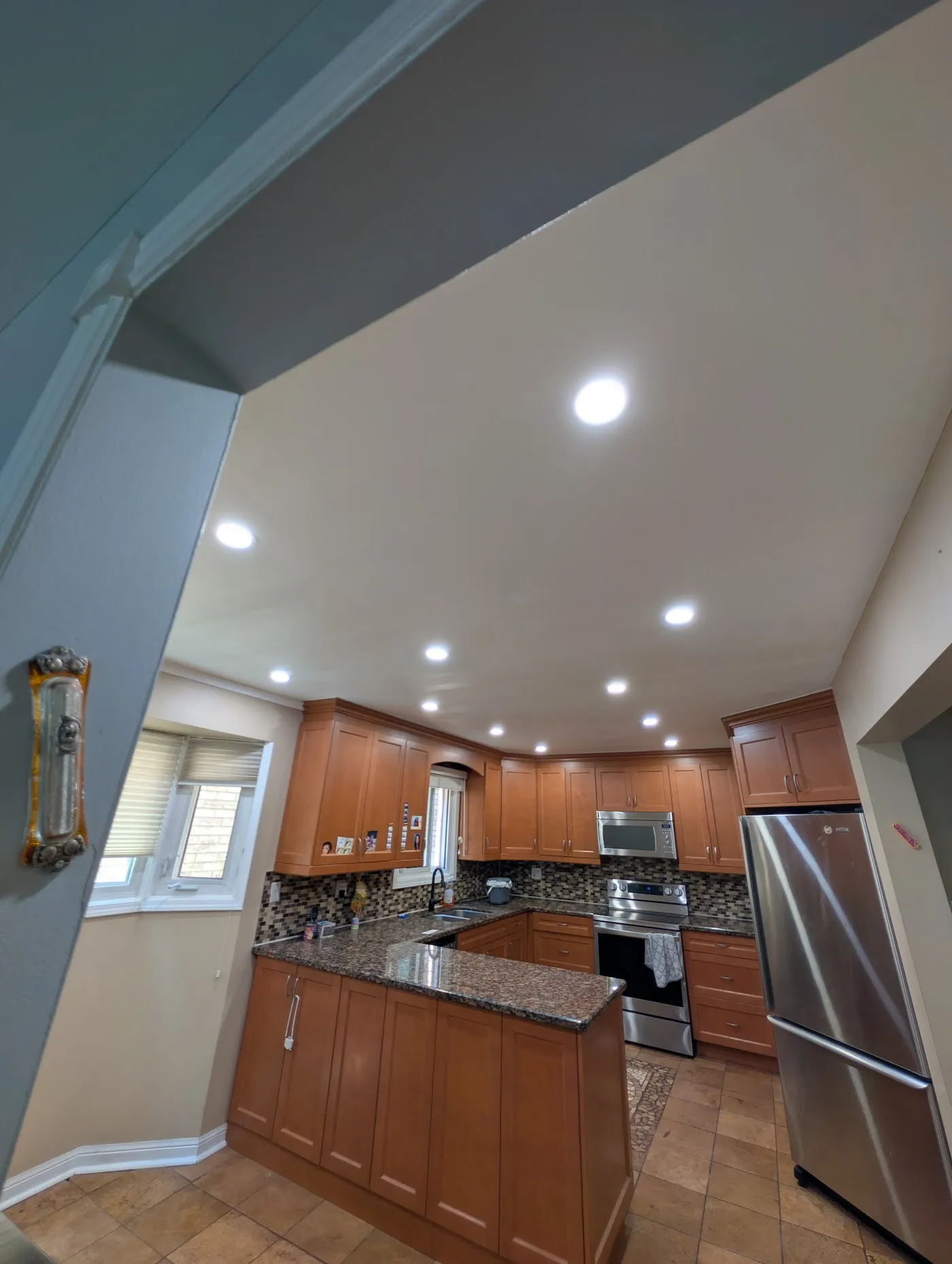 Modern kitchen with freshly painted walls and cabinetry